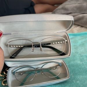 2 Swarovski Glasses with original case and cloth.
